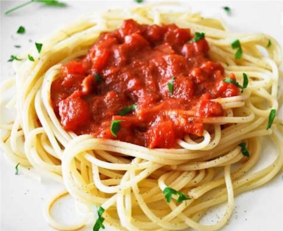 Spaghetti z emulsją maślaną ze świeżymi pomidorami i Grana Padano