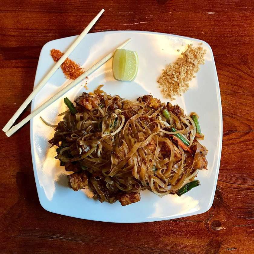 Pad Thai (rice noodles) with eggs, tofu, nuts.