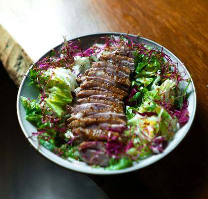Salad with duck in truffle-mustard sauce