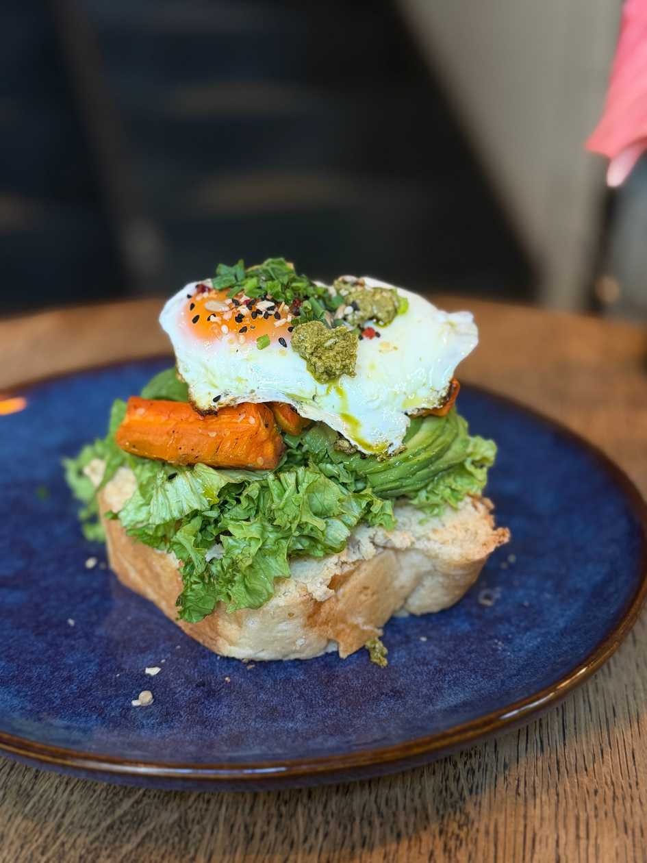 CHALLAH WITH ROASTED CARROTS, FRIED EGG PESTO & AVOCADO